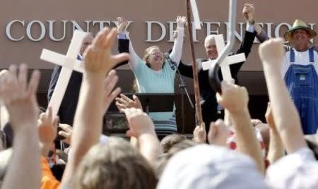 Rowan County Clerk Kim Davis celebrates her release from the Carter County Detention center in Grayson, Kentucky in a September 8, 2015 file photo. REUTERS/Chris Tilley/Files