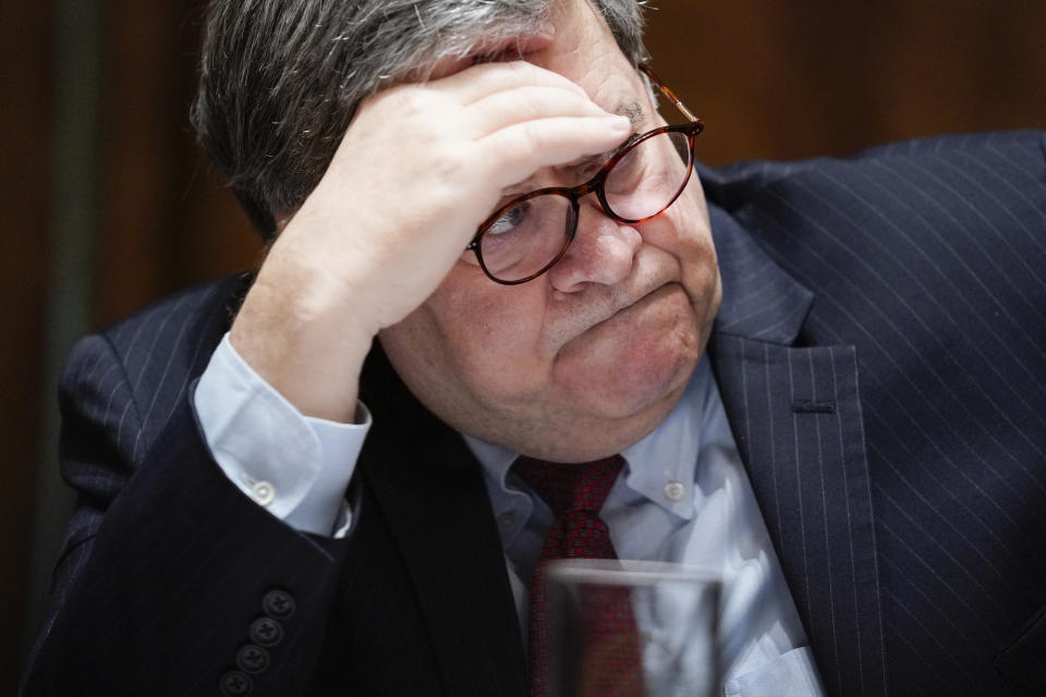 Attorney General William Barr listens during a roundtable with President Donald Trump about America's seniors, in the Cabinet Room of the White House, Monday, June 15, 2020, in Washington. (AP Photo/Evan Vucci)