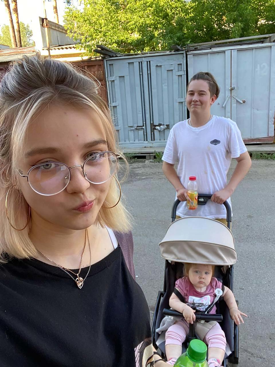 Darya poses, her ex-boyfriend Almaz and daughter Emilia. Source: East2West/Australscope