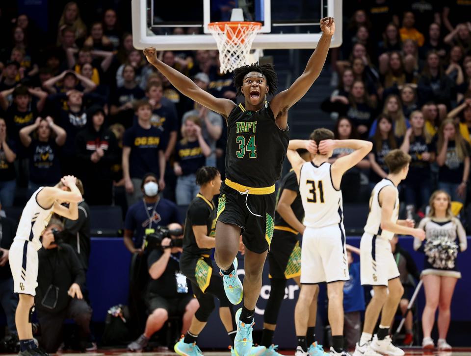 Taft center Kieran Granville-Britten celebrates after the Senators' win the OHSAA DIII state championship over Ottawa-Glandorf, Sunday, March 20, 2022.