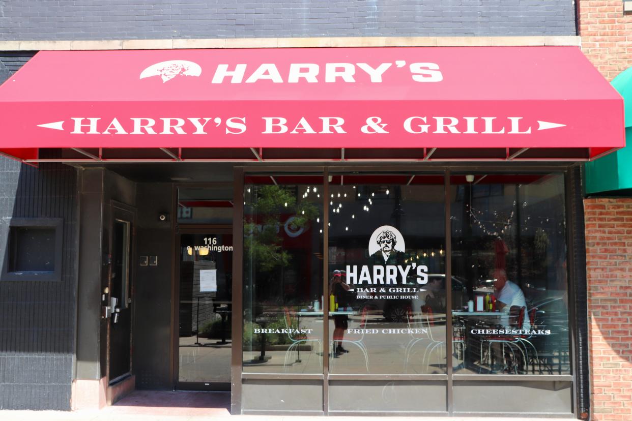 The exterior of Harry's Bar & Grill is seen on Thursday, Aug. 24 in downtown Iowa City. The new restaurant calls on the face of its owner's father, Harry Epstein, in its logo.