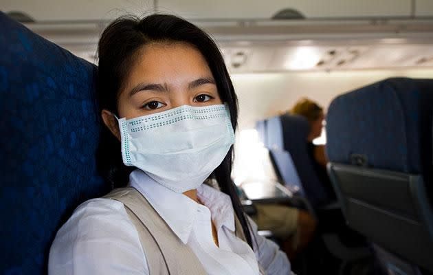 Don't be fooled by the common misconception that recycled air on planes can make you sick. Photo: Getty images