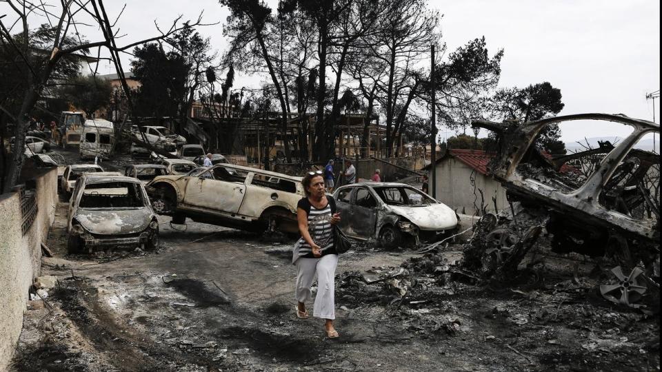 Fires across Greece have killed at least 74 people but the death toll is expected to rise