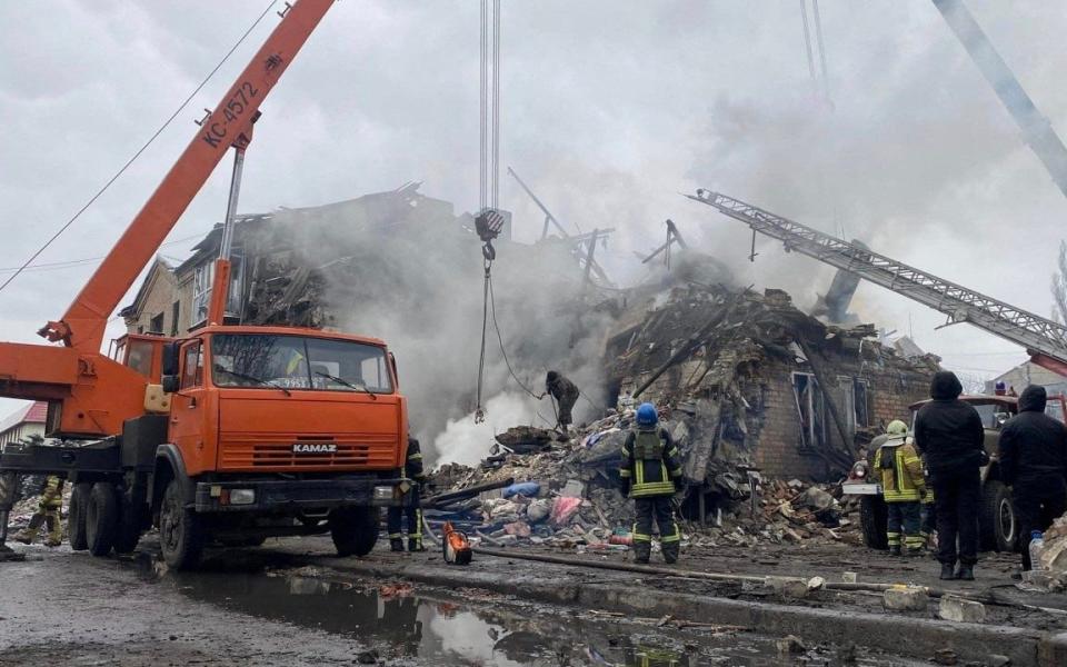 Rescuers work in Novohrodivka after six Russian missiles hit three settlements