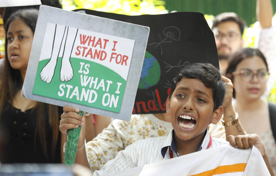 A young protester shouts slogans with others in front of the Ministry of Housing and Urban Affairs in New Delhi, India, Friday, Sept. 20, 2019. The protestors gathered in response to a day of worldwide demonstrations calling for action to guard against climate change began ahead a U.N. summit in New York. (Photo: Manish Swarup/AP)
