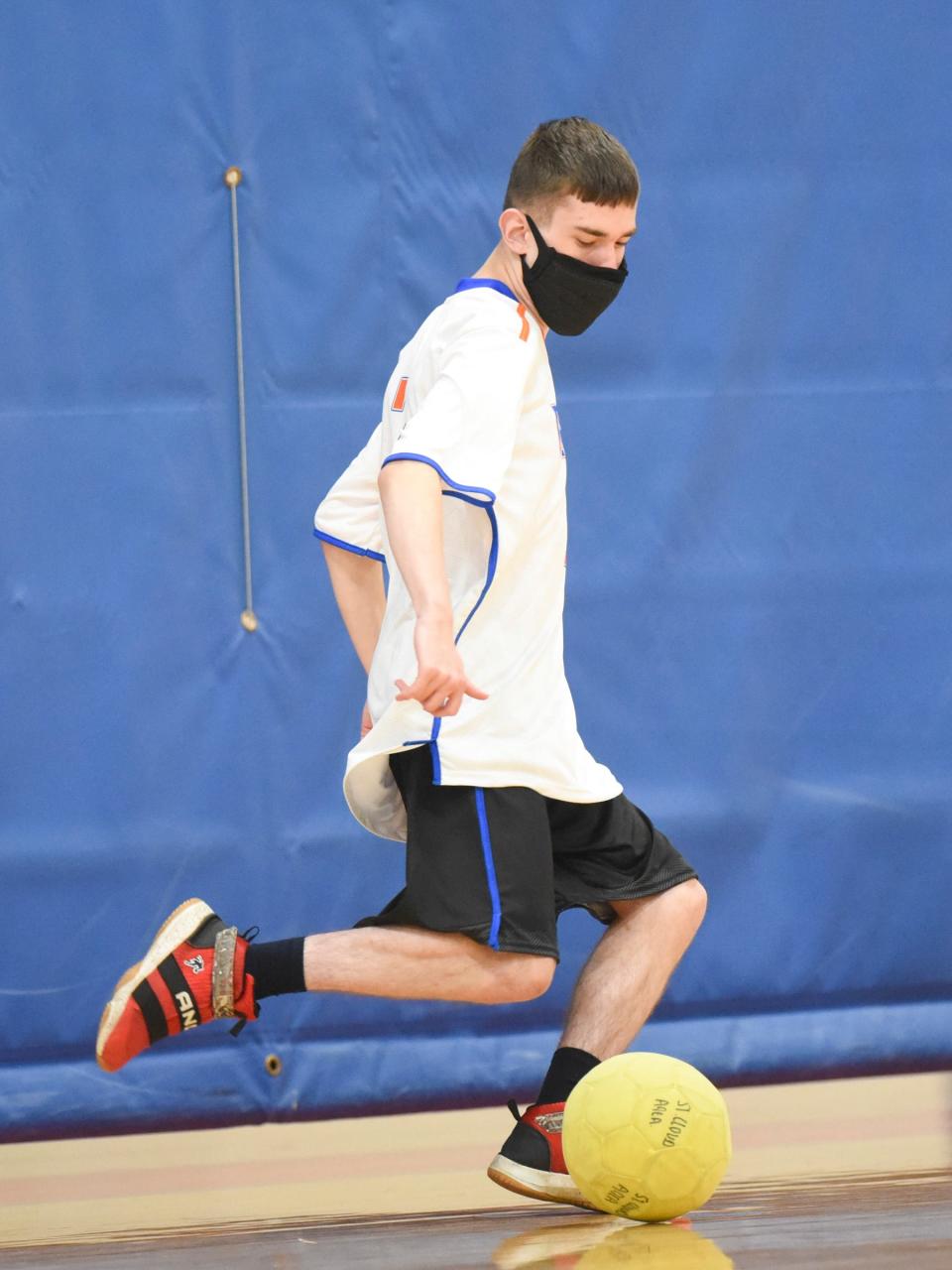 St. Cloud Crush senior Cyrus Heins kicks the ball Tuesday, Oct. 5, 2021, at Apollo High School. 