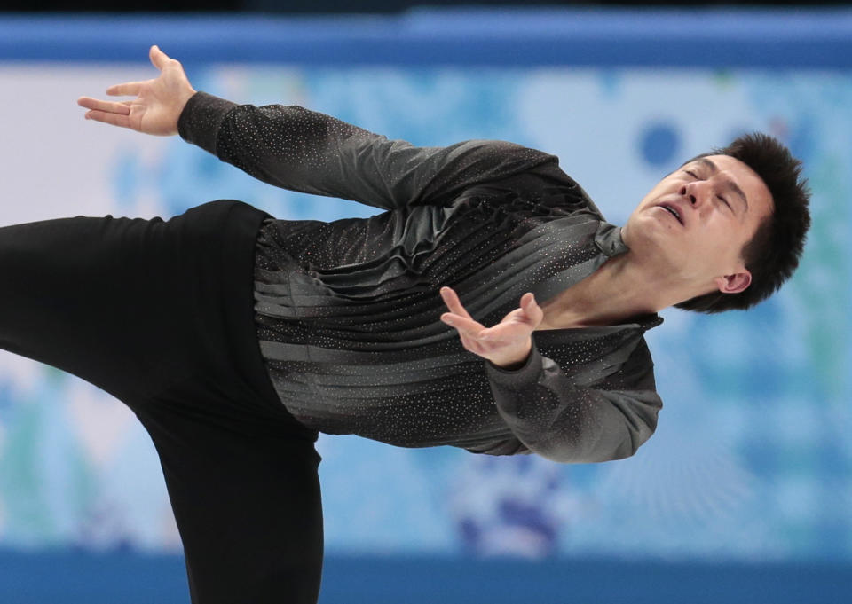 Patrick Chan of Canada competes in the men's team short program figure skating competition at the Iceberg Skating Palace during the 2014 Winter Olympics, Thursday, Feb. 6, 2014, in Sochi, Russia. (AP Photo/Ivan Sekretarev)