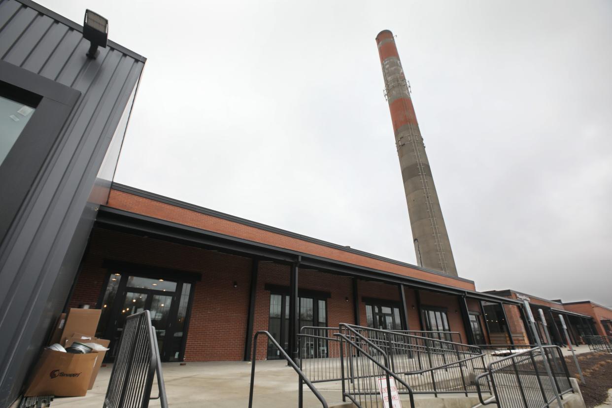 Smokin' Hot Chicks BBQ is under construction in the village of Fairport, Tuesday, Jan. 5, 2021. The restaurant is located just below the old smoke stack in the former American Can Company.