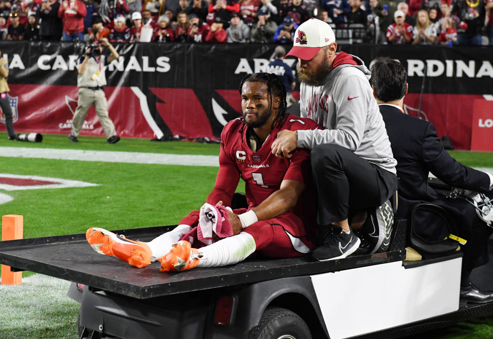 Kyler Murray of the Arizona Cardinals is carted off the field after tearing his ACL last season. (Photo by Norm Hall/Getty Images)