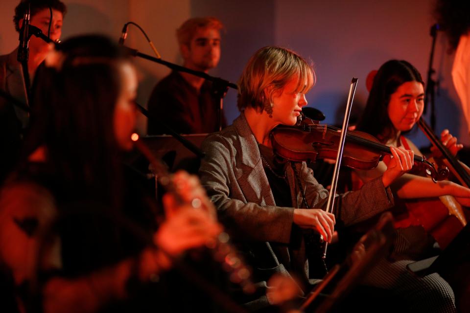FILE - Musicians from the UGA Chamber Ensemble play during a performance of the Athens Hip-Hop Harmonic at Ciné in Athens, Ga., on Wednesday, April 20, 2022.
