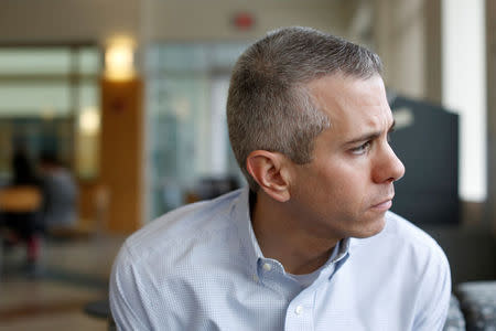 Democratic New York State Assembly member and congressional candidate Anthony Brindisi sits while being interviewed by Reuters after hosting a town hall style meeting at Colgate University in Hamilton, New York, U.S., April 8, 2018. REUTERS/Andrew Kelly