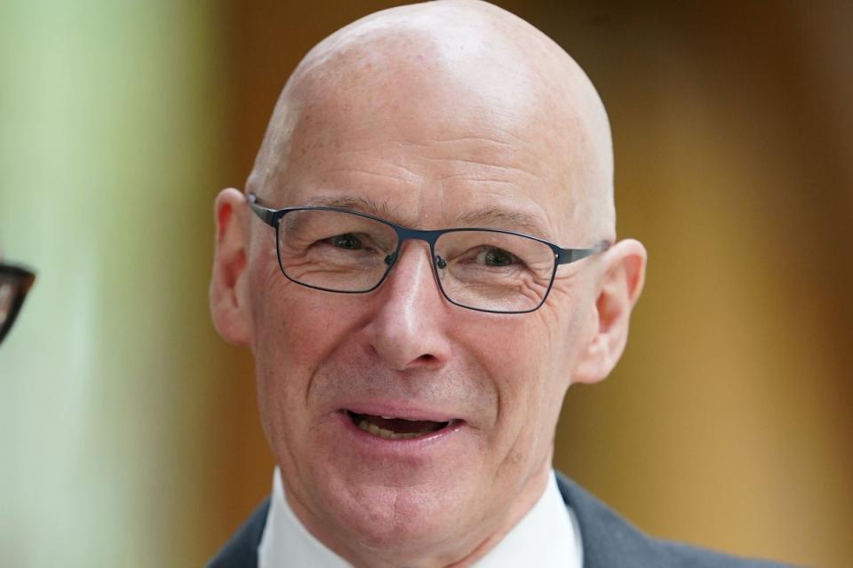 John Swinney at the Scottish parliament in Edinburgh after he became the first candidate to declare his bid to become SNP leader (PA)