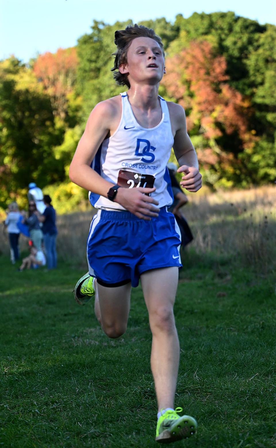 Dover-Sherborn's Aidan Pearsall was the top finisher in the boys race against Norton at the final home cross-country meet of the season at Dover-Sherborn Regional High School in Dover, Oct. 6, 2022.