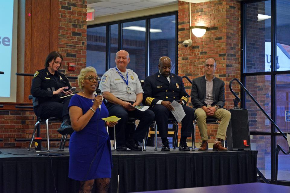 Chiquita Chanay, University of Missouri Extension education director and community health outreach specialist, facilitates a town hall meeting Wednesday on community drug overdose solutions. Panelists included, behind from left, Columbia Police Chief Jill Schlude, Boone County Fire District Chief Scott Olsen, Columbia Fire Chief Clayton Farr Jr. and Lucas Buffaloe, doctor of family and addiction medicine.