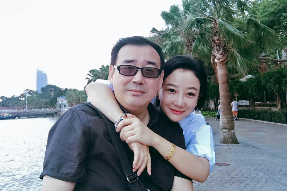 FILE - This undated, file photo released by Chongyi Feng shows Yang Hengjun, left, and his wife Yuan Xiaoliang. Australia's foreign minister says on Thursday, Jan. 19, 2023 that her government is "deeply troubled" by the delays in China resolving espionage allegations against Chinese-Australian Yang Hengjun, while a supporter says the writer and blogger will remain detained until at least April. (Chongyi Feng via AP, File)