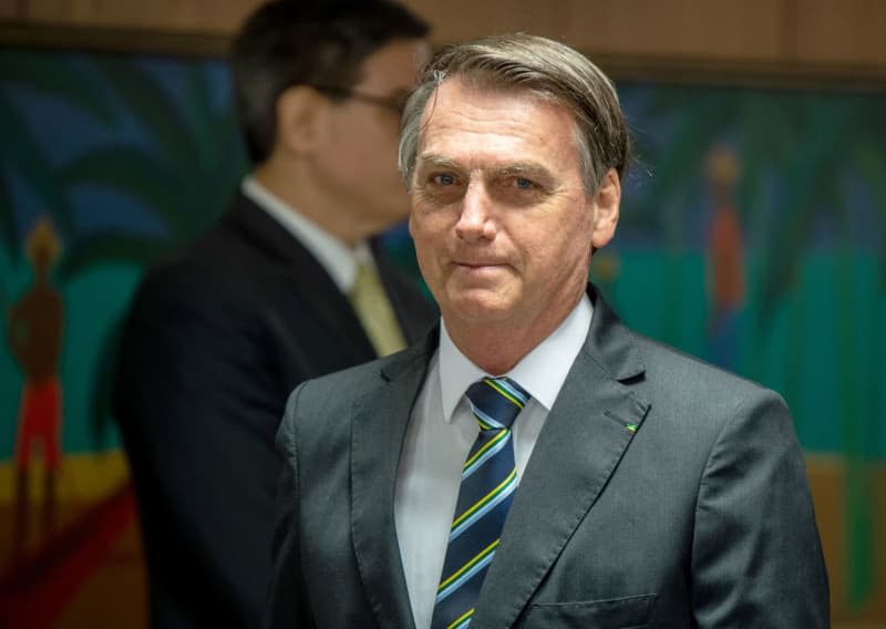 Then Brazilian President Jair Bolsonaro pictured during a meeting. Brazil's former president Jair Bolsonaro has refused to testify during his police interrogation as part of the investigation into an alleged coup d'état following the last presidential election. Fabian Sommer/dpa