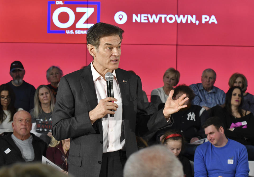 Mehmet Oz, the TV celebrity and heart surgeon who is running for the Republican nomination for U.S. Senate in Pennsylvania, speaks at a town hall-style event at the Newtown Athletic Club, Feb. 20, 2022, in Newtown, Pa. (AP Photo/Marc Levy)
