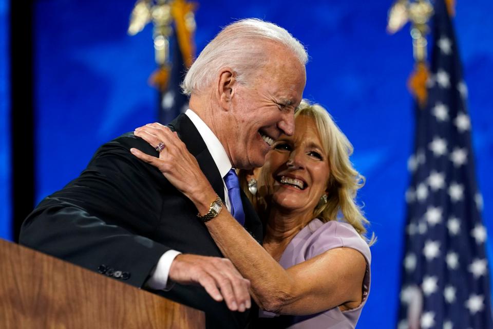 Democratic presidential candidate former Vice President Joe Biden hugs his wife Jill Biden after his speech during the fourth day of the Democratic National Convention, Thursday, Aug. 20, 2020, at the Chase Center in Wilmington, Del.