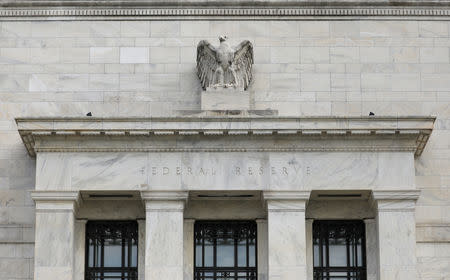 FILE PHOTO: The Federal Reserve building is pictured in Washington, DC, U.S., August 22, 2018. REUTERS/Chris Wattie/File Photo