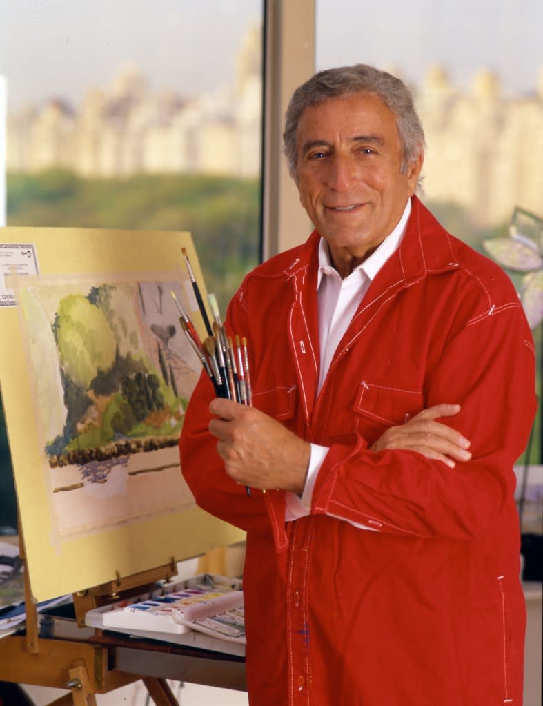 Bennett paints in his New York Central Park West penthouse apartment in June 2002. Getty Images