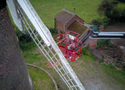 A homeowner has completed the ultimate lockdown DIY project at one of Britain's last fully-working windmills - after using a cherry picker to paint the sails by hand. Jeanette McGarry, 58, painstakingly spent three weeks touching up the paintwork on the gigantic five tonne sails as part of a refurbishment of historic Berkswell Windmill. The 70ft tall Grade II-listed building has been standing for nearly 200 years in the village of Balsall Common, West Mids., and was bought by Jeannette in 2005. She then spent £200,000 restoring the 19th century four-bladed tower mill to its former glory with the help of English Heritage after it fell into a state of disrepair.