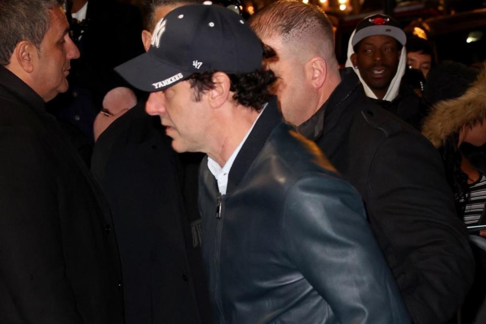 <p>T.JACKSON / BACKGRID</p> Sacha Baron Cohen enters 