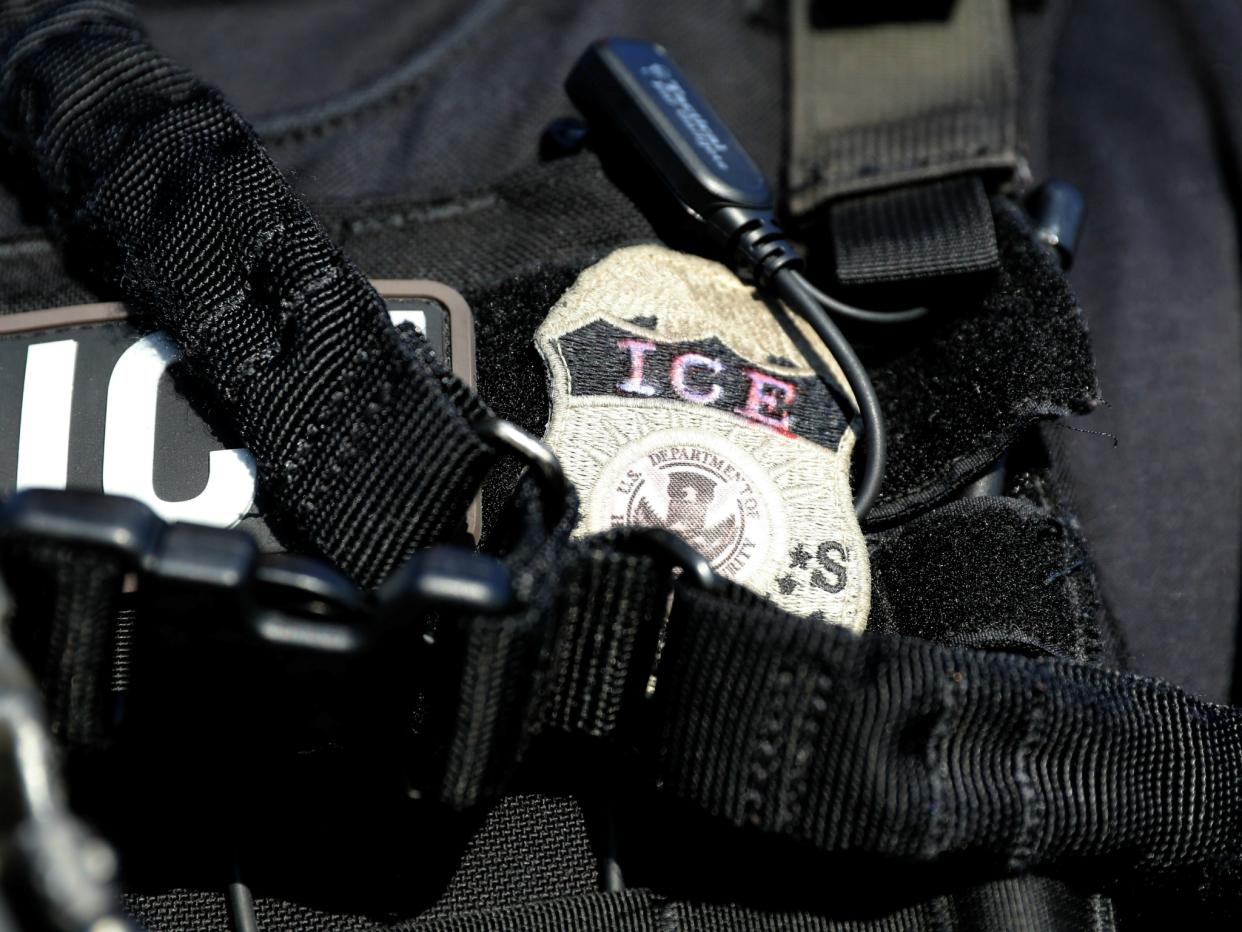 The badge of a U.S. Immigration and Customs Enforcement agent, on an operation in Santa Ana, California: Reuters//Lucy Nicholson