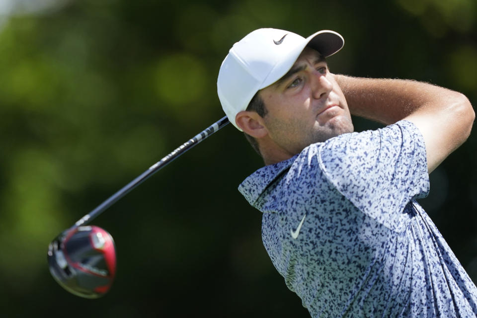 Scottie Scheffler hits tee shot on the second hole during the third round of the Byron Nelson golf tournament in McKinney, Texas, Saturday, May 13, 2023. (AP Photo/LM Otero)