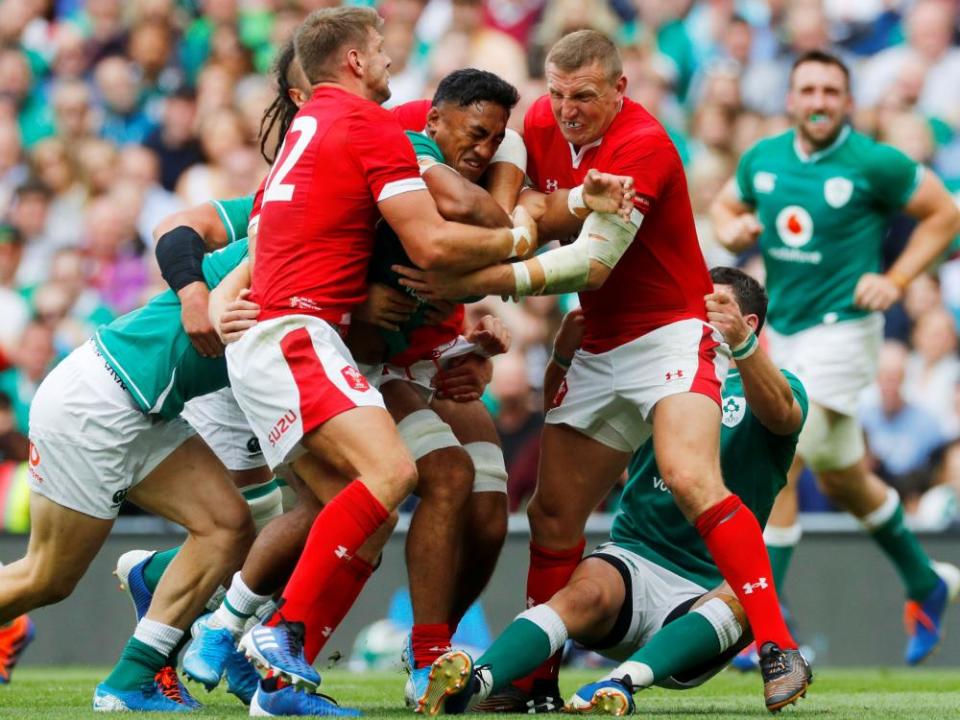 Wales tackle Bundee Aki during their warm-up defeat in Ireland.