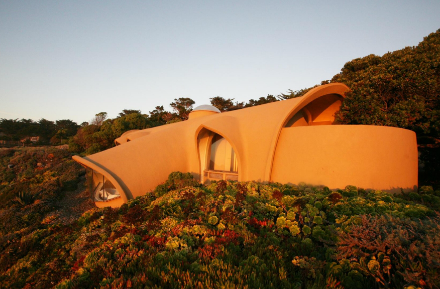 Seashell home undulates with Carmel landscape exterior wide