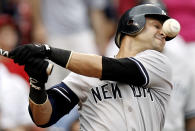 BOSTON, MA - JULY 7: Nick Swisher #33 of the New York Yankees fouls off a ball during the eighth inning of game one of a doubleheader against the Boston Red Sox at Fenway Park on July 7, 2012 in Boston, Massachusetts. (Photo by Winslow Townson/Getty Images)