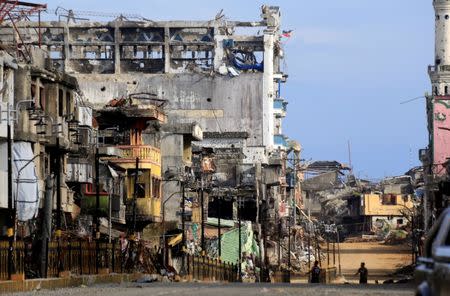 Damaged buildings are seen after government troops cleared the area from pro-Islamic State militant groups inside war-torn Bangolo town, Marawi City, southern Philippines October 23, 2017. REUTERS/Romeo Ranoco