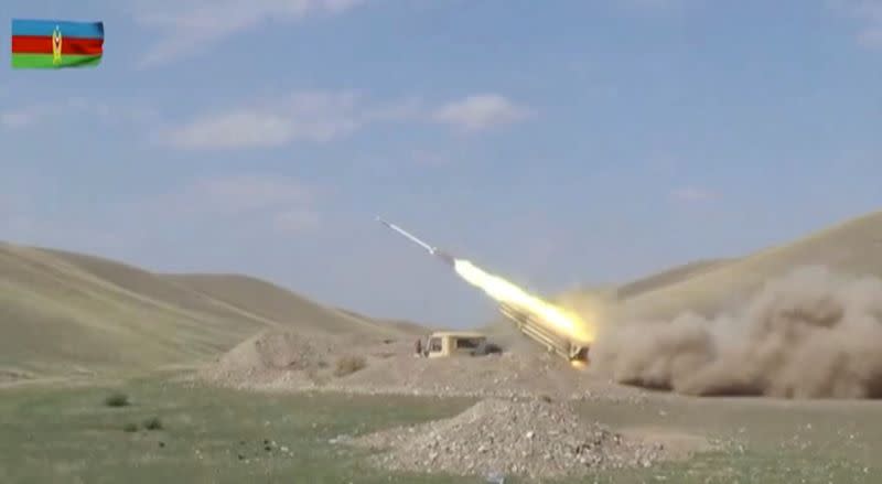 A still image shows an Azeri multiple rocket launcher performing strikes during clashes over the breakaway region of Nagorno-Karabakh