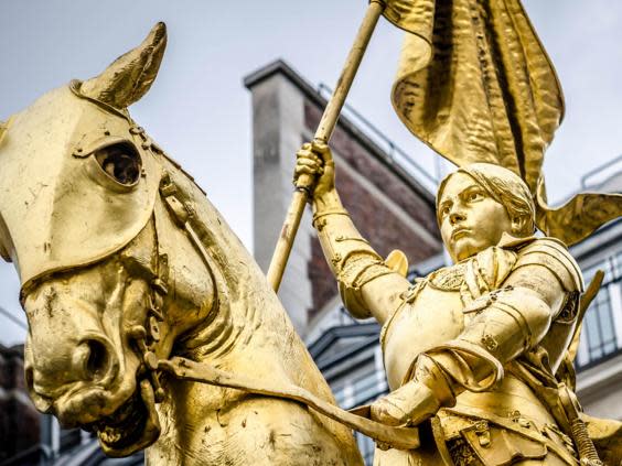 Joan of Arc, whose statue stands in Paris, led an army to victory dressed as a soldier during the Hundred Years War when women were not supposed to fight (Shutterstock)