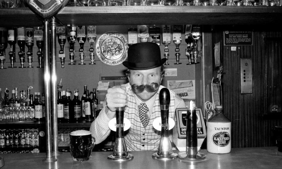 Bobby Moore preparing for the opening of his own pub called Moore’s at Stratford Broadway, London, in  November 1976.