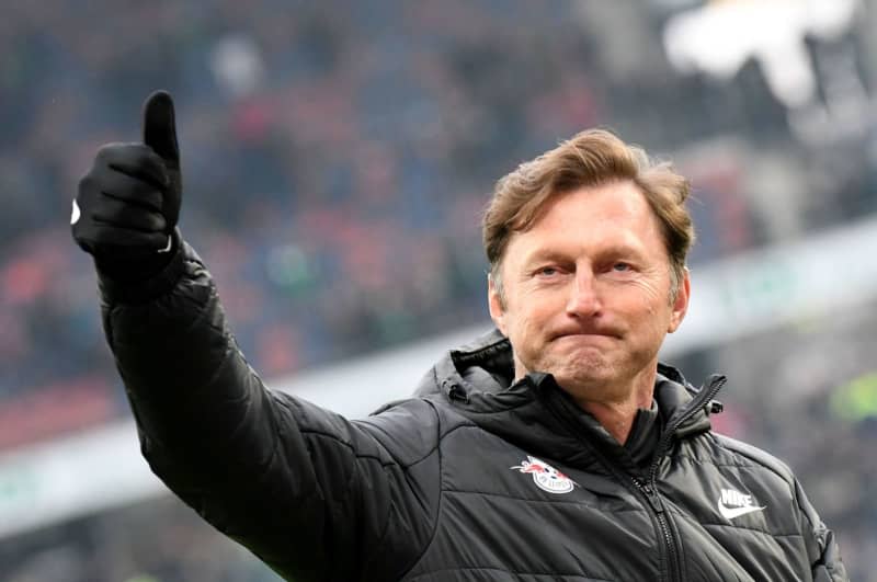 Leipzig's former coach Ralph Hasenhuettl cheers on the fans after the German Bundesliga soccer match between Hannover 96 and RB Leipzig in the HDI-Arena. Media reports said that ex-Southampton and RB Leipzig boss Ralph Hasenhuettl is set to take over after Wolfsburg coach Niko Kovac has been sacked. Peter Steffen/dpa