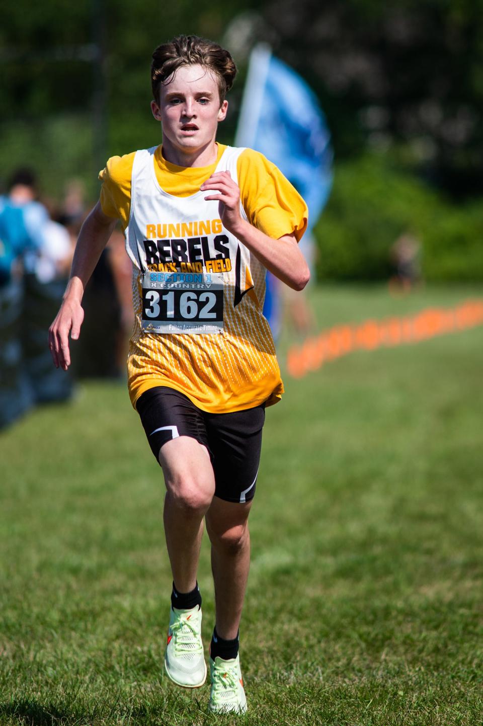 Lakeland's Bobby Mayclim runs to the finish line in the boys division 1 race during the Somers Big Red Cross Country Invitational at Somers High School in Lincolndale on Saturday, September 10, 2022.