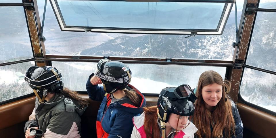 Students from Barr Beacon school on a New Hampshire ski lift.