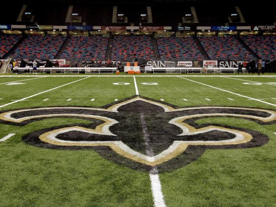 Ties between local church leaders and the Saints include a close friendship between New Orleans Archbishop Gregory Aymond and Gayle Benson, who inherited the Saint (Getty Images)