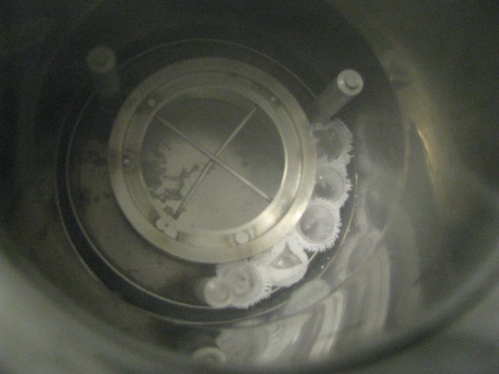 Experimental samples are loaded into the specially designed dewar which is shortly thereafter filled with liquid nitrogen and placed under gamma irradiation. Note that the flame-sealed test tubes are wrapped in cotton cloth to hold them together, as test tubes become buoyant in liquid nitrogen and will float around in the dewar, interfering with proper radiation exposure.