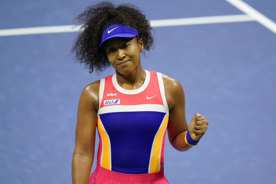 Naomi Osaka, of Japan, celebrates after winning a match against Anett Kontaveit, of Estonia, during the fourth round of the US Open tennis championships, Monday, Sept. 7, 2020, in New York. (AP Photo/Frank Franklin II)