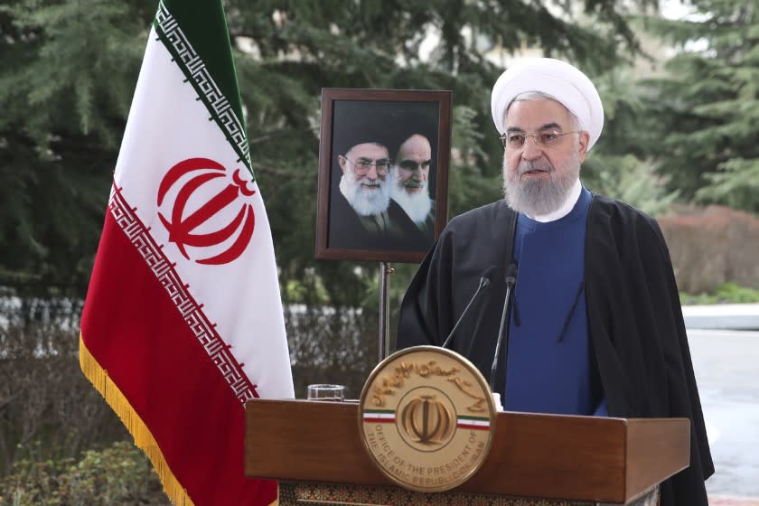 In this photo released on Saturday March 20, 2021 by the official website of the office of the Iranian Presidency, President Hassan Rouhani delivers a message for the Iranian New Year, or Nowruz, in Tehran, Iran. Both the Supreme Leader and President claimed that enemies of Iran have admitted failure in bringing the nation to its knees through maximum pressure. (Iranian Presidency Office via AP)