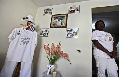 Current leader of Cuban dissident group "Ladies in White," Berta Soler, stands during a tribute to late leader Laura Pollan on her 63rd birthday in Havana February 13, 2012. The "Ladies in White" is a group made up of family members of imprisoned dissidents. REUTERS/Enrique de la Osa/Files