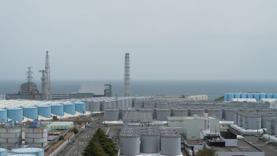 TEPCO has built over 1,000 massive tanks to store treated radioactive wastewater in Fukushima, Japan, on April 12, 2023. - Daniel Campisi/CNN