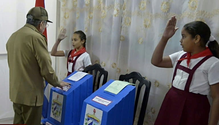 Cuban President Raul Castro casts his ballot ratifying a new National Assembly that will choose his successor, a major transition for a country led by Castros for nearly 60 years