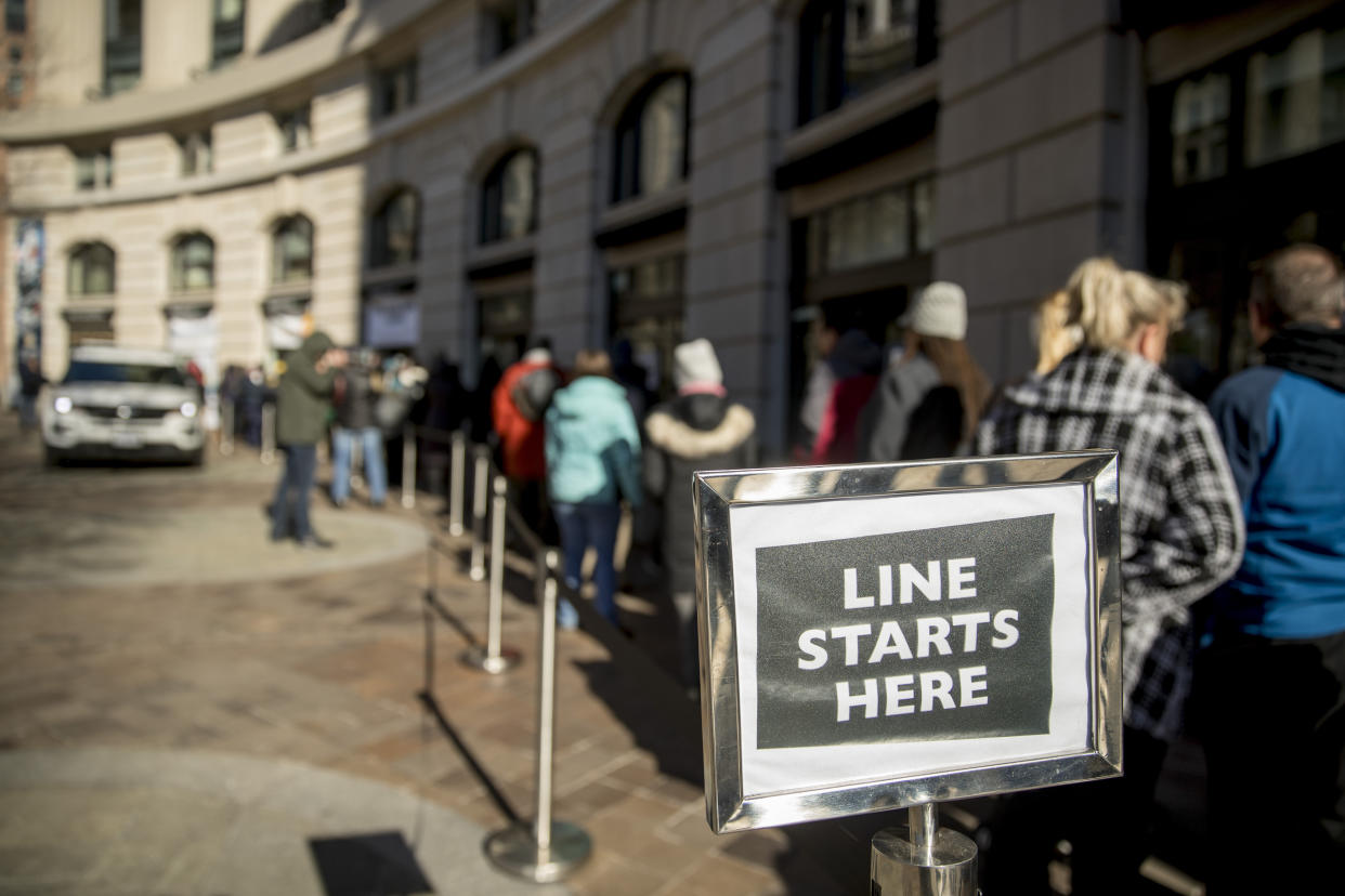 Furloughed workers wait in line on Tuesday to receive food and supplies from World Central Kitchen, the not-for-profit organization started by Chef Jose Andres in Washington, D.C. (Photo: ASSOCIATED PRESS/Andrew Harnik)