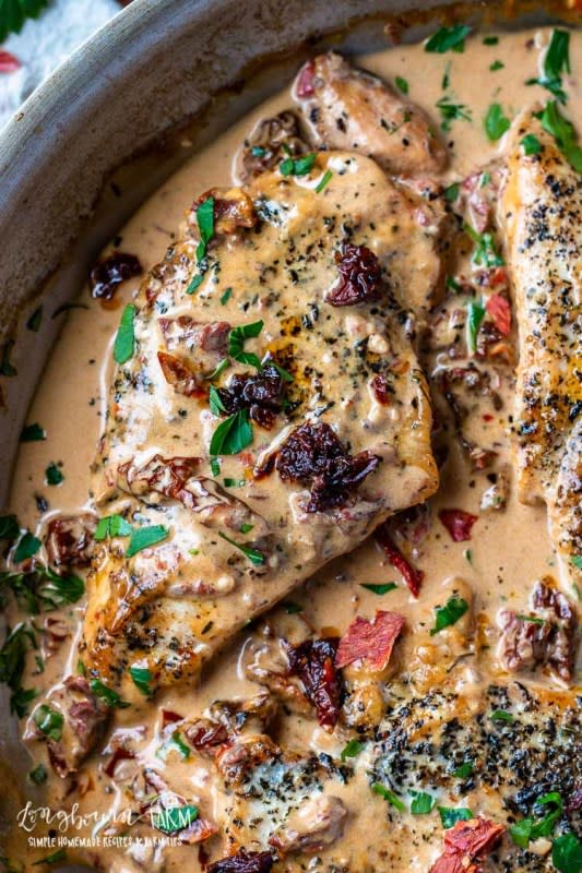 <p>Longbourn Farm</p><p>Sun-dried tomatoes, basil, and a creamy sauce make this quick holiday dish simply irresistible. </p><p><strong>Get the recipe: <a href="https://longbournfarm.com/creamy-tuscan-chicken/" rel="nofollow noopener" target="_blank" data-ylk="slk:Creamy Tuscan Chicken;elm:context_link;itc:0;sec:content-canvas" class="link rapid-noclick-resp">Creamy Tuscan Chicken</a></strong></p><p><strong>Related: <a href="https://parade.com/1043586/parade/chicken-breast-recipes/" rel="nofollow noopener" target="_blank" data-ylk="slk:40 Best Chicken Breast Recipes;elm:context_link;itc:0;sec:content-canvas" class="link rapid-noclick-resp">40 Best Chicken Breast Recipes</a></strong></p>