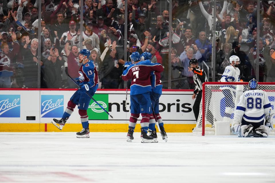 Colorado Avalanche right wing Valeri Nichushkin (13) celebrates a goal against Tampa Bay Lightning goaltender Andrei Vasilevskiy (88) during the third period in Game 5 of the NHL hockey Stanley Cup Final, Friday, June 24, 2022, in Denver. (AP Photo/Jack Dempsey)