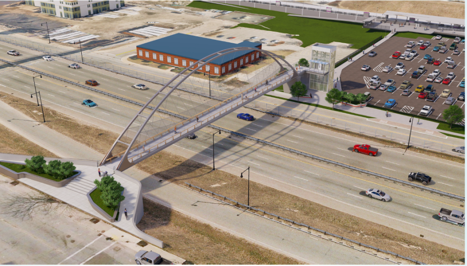 Rendition of the pedestrian bridge over John F. Kennedy Boulevard between Purchase Street and the new downtown MBTA station.