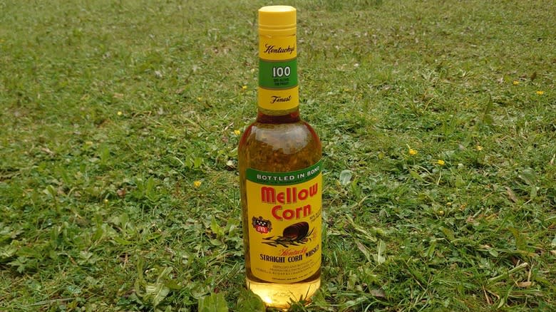 Mellow Corn bottle on grass